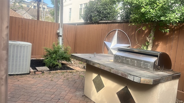 view of patio / terrace with central AC unit