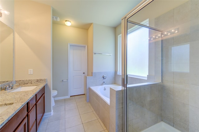 full bathroom with tile patterned floors, vanity, toilet, and shower with separate bathtub