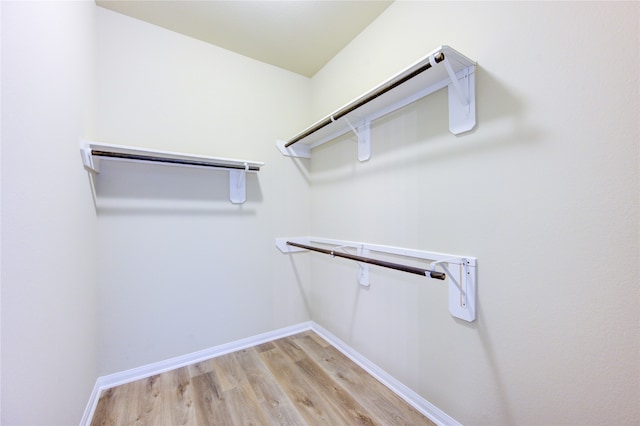 walk in closet featuring light wood-type flooring