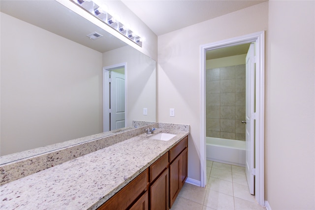 bathroom featuring tile patterned floors and vanity