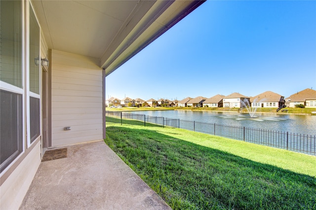 view of yard with a water view