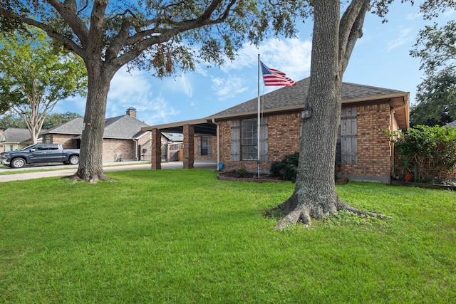 ranch-style home with a front yard