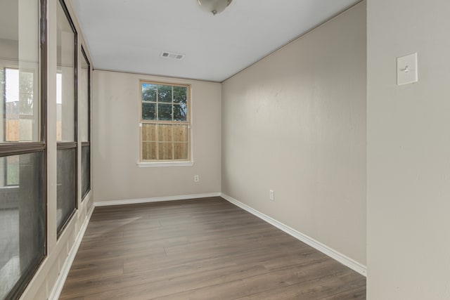 unfurnished room featuring hardwood / wood-style floors