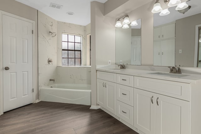 bathroom featuring vanity and hardwood / wood-style flooring