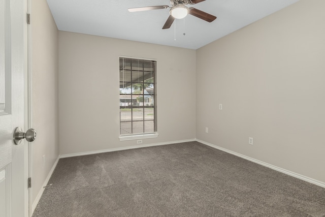 unfurnished room with carpet and ceiling fan