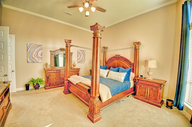 carpeted bedroom featuring ceiling fan and ornamental molding