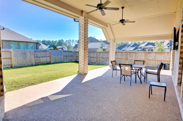 view of patio / terrace featuring ceiling fan