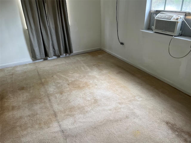 empty room with light carpet and cooling unit