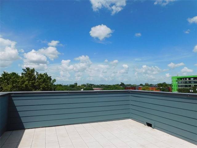 view of patio / terrace with a balcony