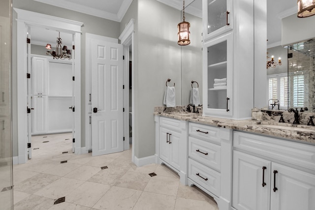 bathroom featuring a notable chandelier, an enclosed shower, crown molding, and vanity