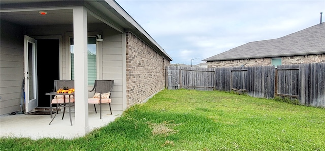 view of yard with a patio area