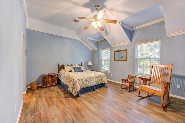 bedroom featuring ceiling fan, light hardwood / wood-style flooring, crown molding, and lofted ceiling