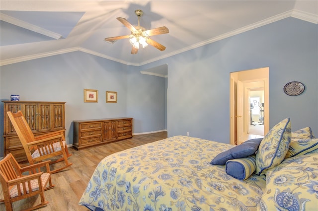 bedroom with crown molding, ceiling fan, and lofted ceiling