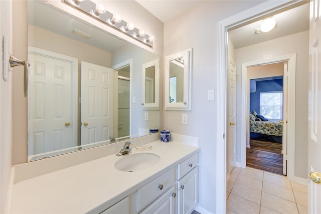 bathroom featuring vanity and tile patterned floors