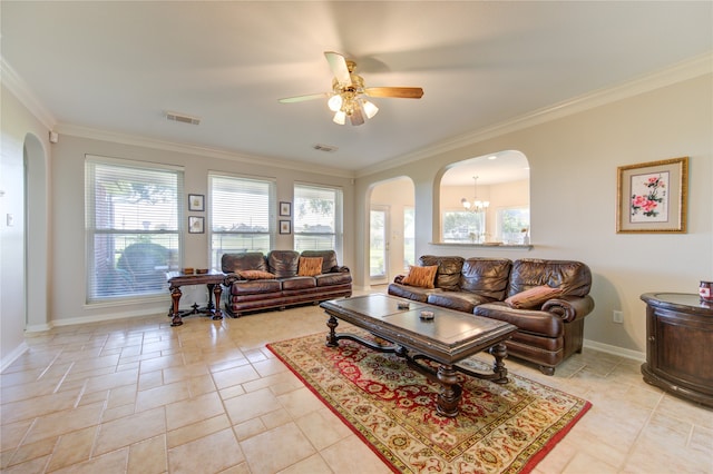 living room featuring ceiling fan with notable chandelier and ornamental molding