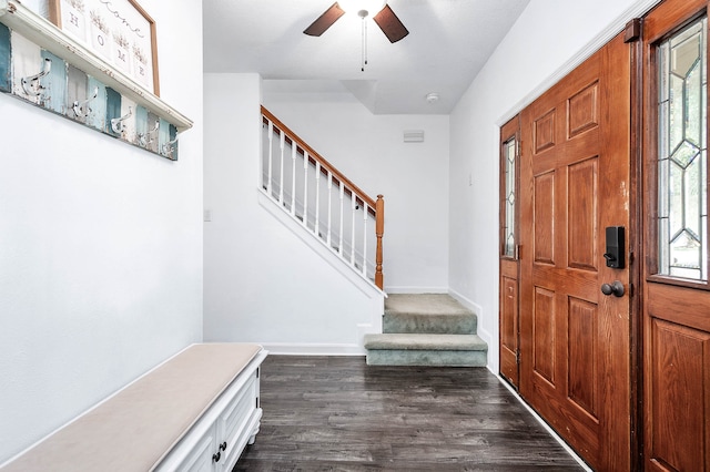 foyer entrance featuring dark hardwood / wood-style floors and ceiling fan