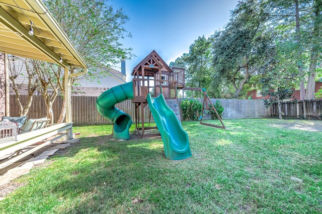 view of playground featuring a yard