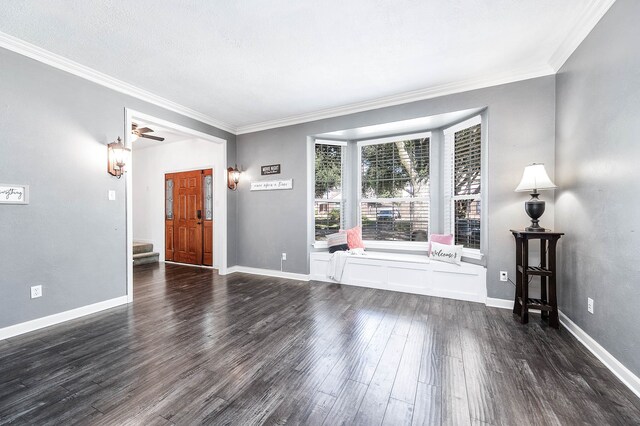 unfurnished room featuring crown molding and dark hardwood / wood-style floors