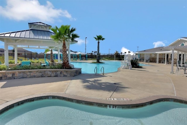 view of pool featuring a gazebo and a patio