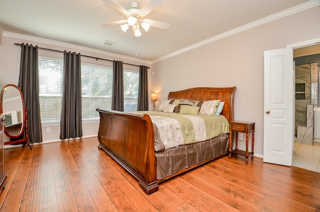 bedroom featuring ceiling fan, crown molding, and wood-type flooring