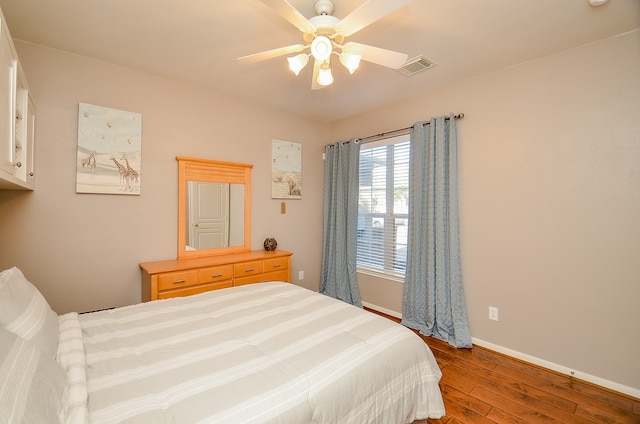 bedroom featuring wood-type flooring and ceiling fan