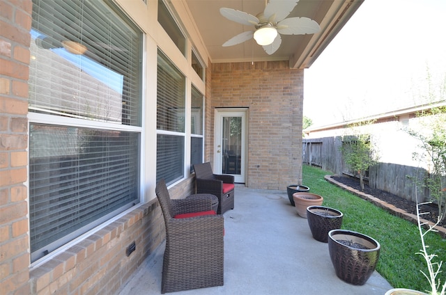 view of patio featuring ceiling fan