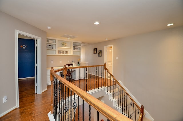 hall with dark hardwood / wood-style floors