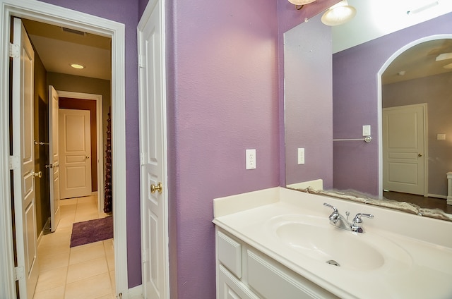 bathroom featuring tile patterned floors and vanity