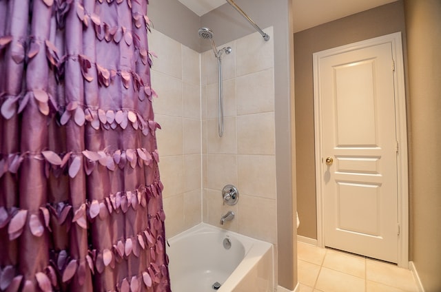 bathroom featuring tile patterned floors and shower / bath combo with shower curtain