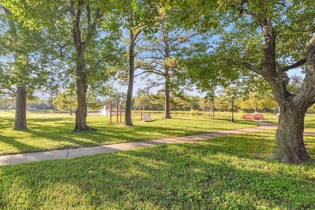 view of community featuring a yard