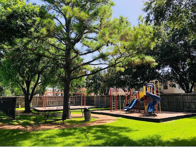 view of jungle gym with a yard