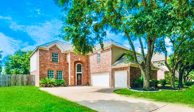 front facade with a front lawn and a garage