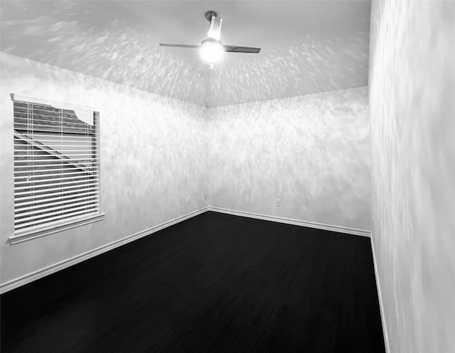 spare room featuring ceiling fan and hardwood / wood-style floors