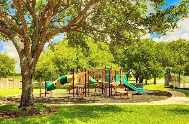 view of play area featuring a lawn