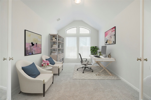 office featuring light colored carpet and lofted ceiling