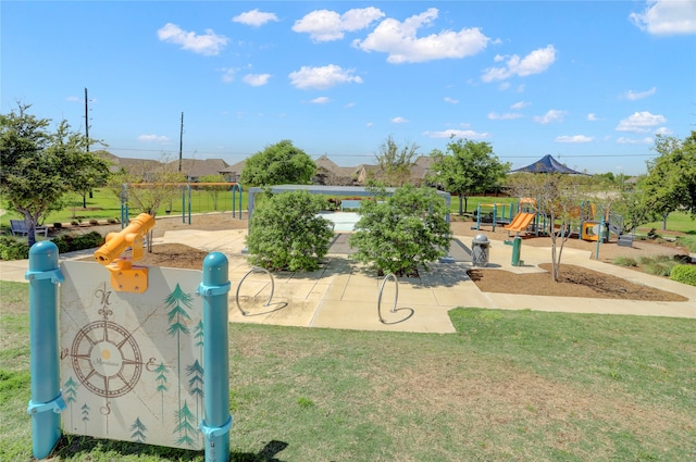 view of playground featuring a lawn