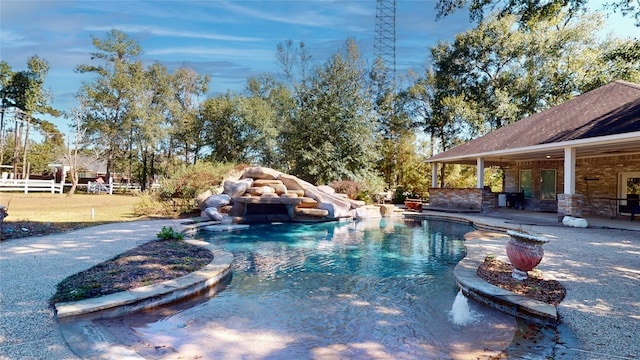 view of pool featuring a patio