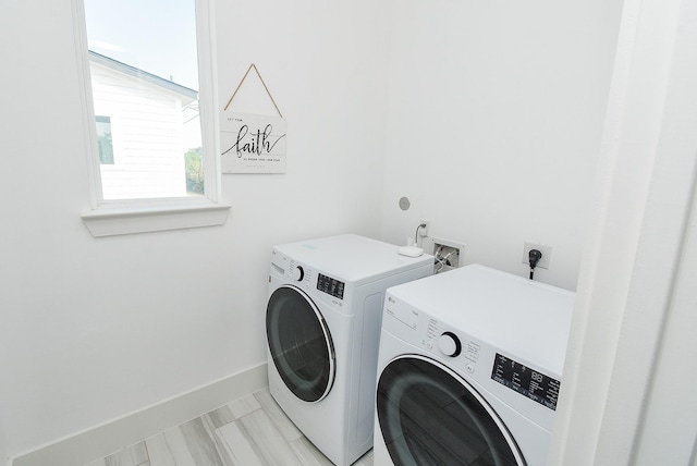 washroom featuring independent washer and dryer