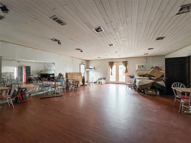 miscellaneous room with dark hardwood / wood-style flooring, wooden ceiling, and french doors