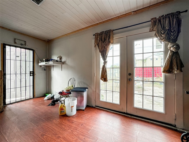 entryway with wooden ceiling, french doors, a healthy amount of sunlight, and hardwood / wood-style flooring