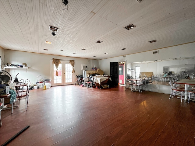 miscellaneous room featuring dark hardwood / wood-style flooring