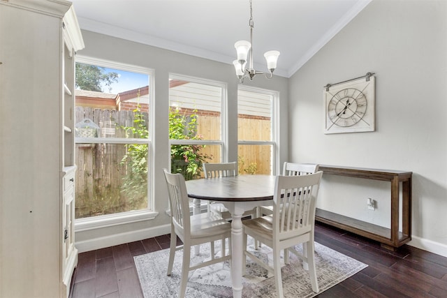 dining space with an inviting chandelier, ornamental molding, dark wood-type flooring, and vaulted ceiling