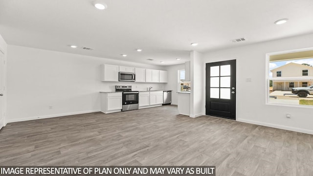 interior space featuring light wood-type flooring