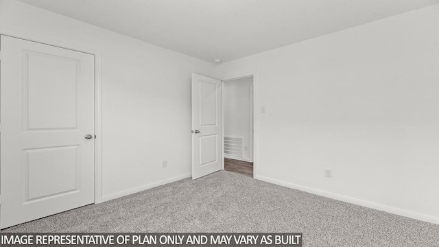 unfurnished bedroom featuring light carpet