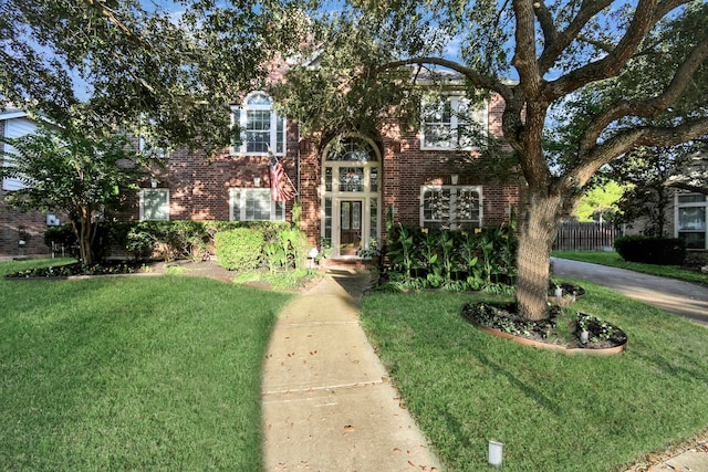 view of front of home with a front yard