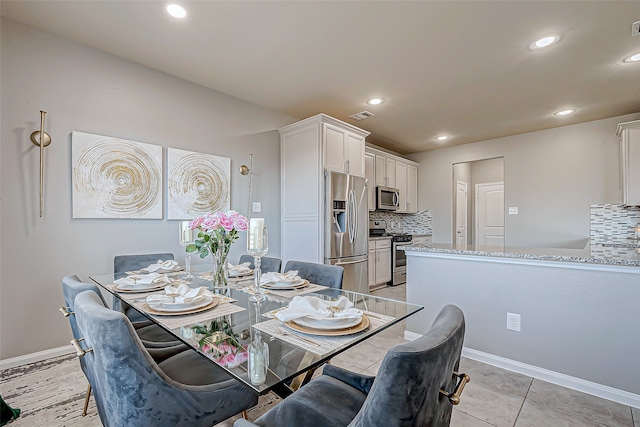 dining room with light tile patterned floors