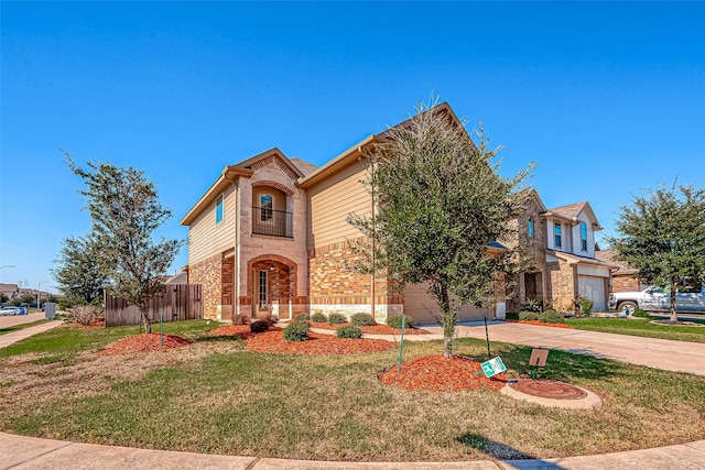 view of front of house featuring a garage, a balcony, and a front lawn