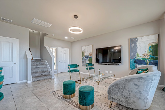 living room with light tile patterned floors