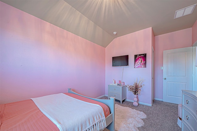 carpeted bedroom featuring vaulted ceiling