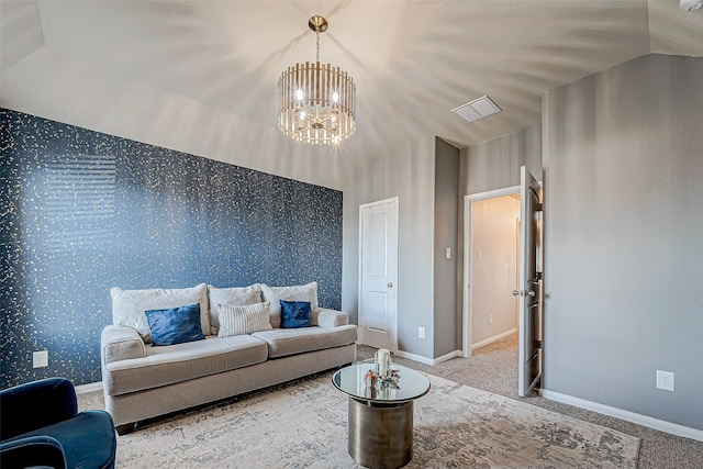 living room with carpet and a chandelier